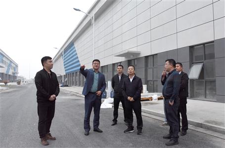 覃振華到江蘇、安徽兩地調研市場經營